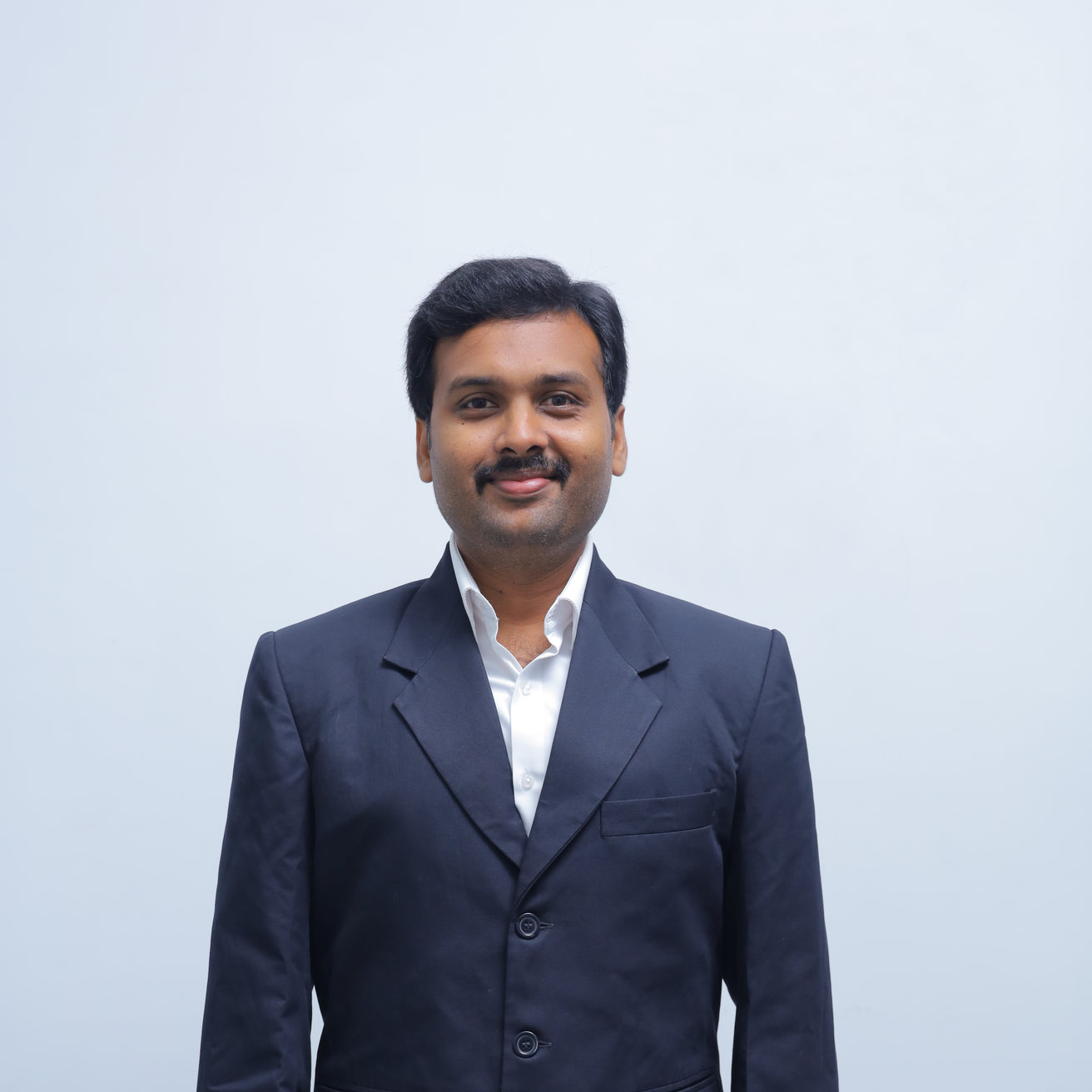 Dr. ELANGO K S