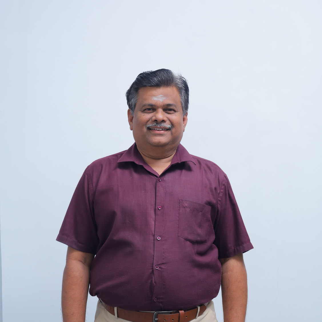 Dr.RAJU S